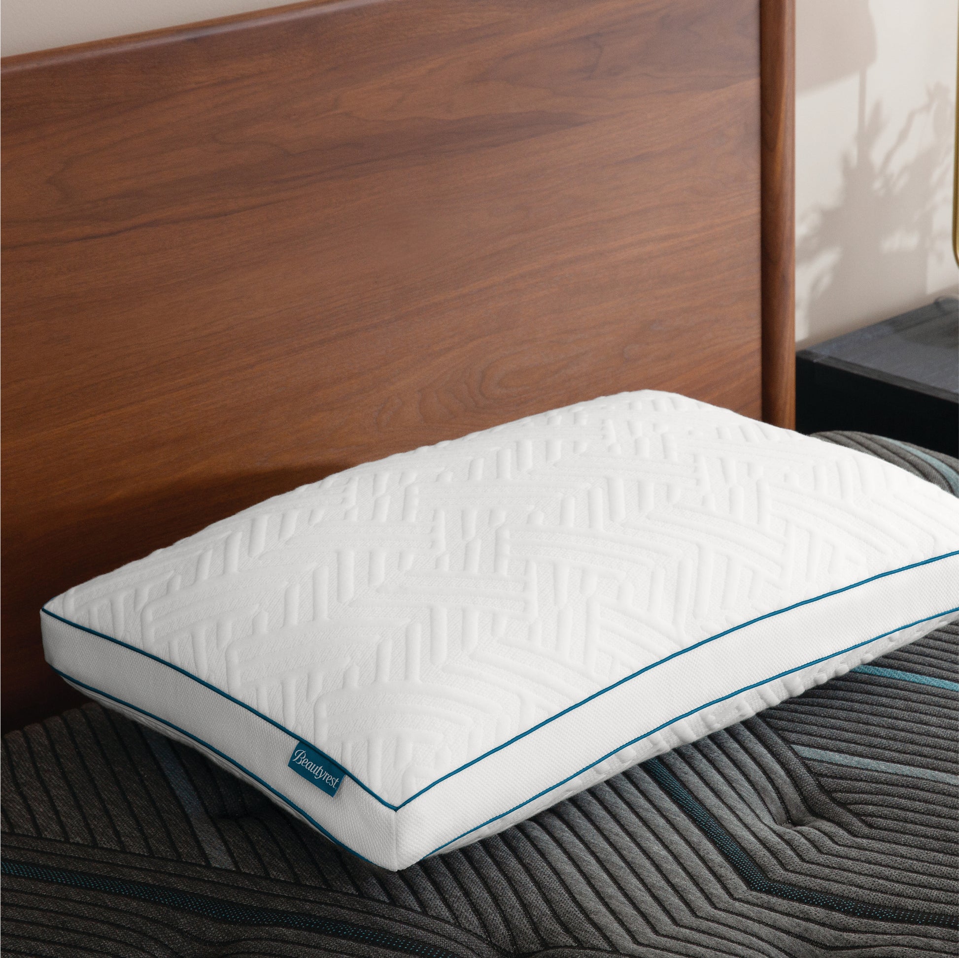 A Beautyrest Down Alternative Pillow placed on top of Beautyrest mattress